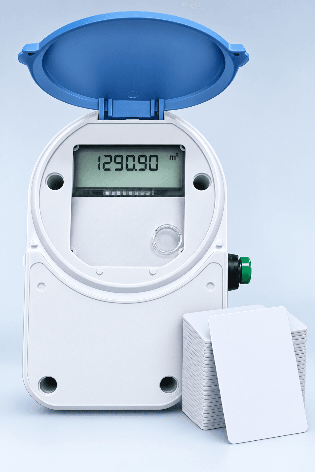 A MajiLink prepaid public water meter with its lid open, beside a stack of customer cards.